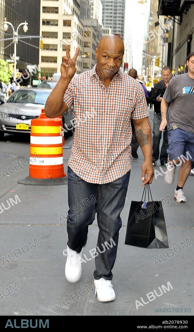 May 7, 2013 - New York City, NY, USA - Boxer Mike Tyson walks in Midtown Manhattan on May 7 2013 in New York City. 07/05/2013