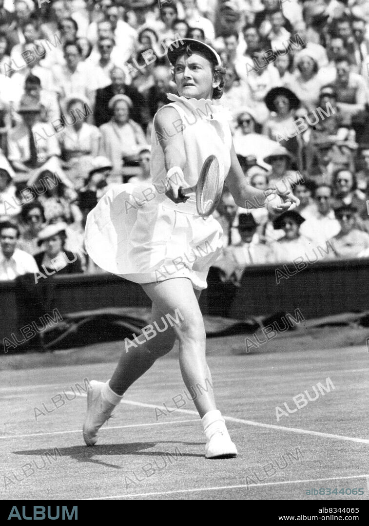 Championship Worries - Slightly worried expression is worn by Australia's Beryl Penrose, concentrating on her Centre Court battle against wily and dangerous American Louise Brough in the women's singles of the Lawn Tennis Championships at Wimbledon, London, to-day (Friday). June 27, 1952. (Photo by Reuter Photo).
