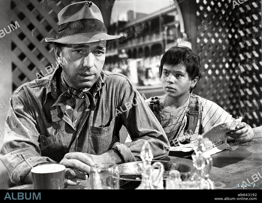 HUMPHREY BOGART and ROBERT BLAKE in THE TREASURE OF THE SIERRA MADRE, 1948, directed by JOHN HUSTON. Copyright WARNER BROTHERS.