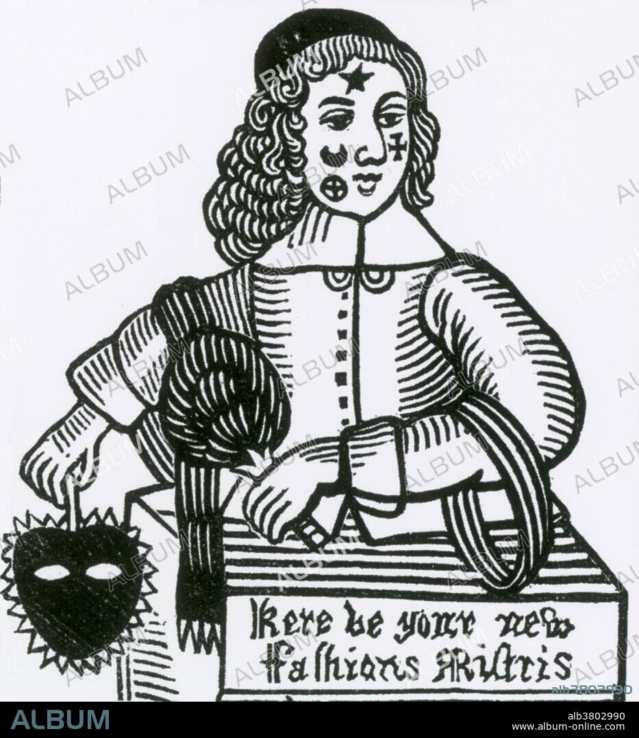A 17th-century engraving of an extremely patched face.  In the 1600s, it was in vogue for both women and men to paste black patches on their faces. Here the patches are in the shape of stars and moons and crosses.  At first, the patches may have been used to cover pockmarks but soon were treated as beautiful adornments.  Special boxes with mirrors were made to keep the black taffeta patches.