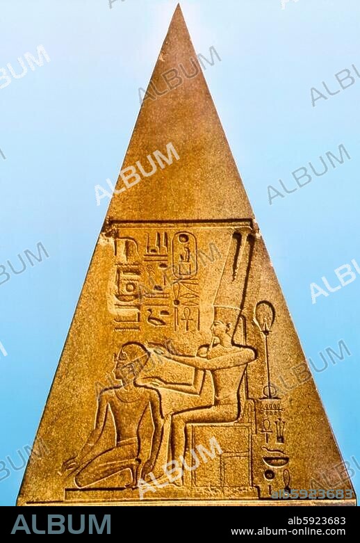 Relief on a fallen obelisk at Karnak. Queen Hatshepsut dressed in the costume of a Pharaoh and depicted as a man, is crowned by the god Amun. Amun and the hieroglyphs denoting his name were defaced during the reign of Akhenaton and restored later Country o (..).