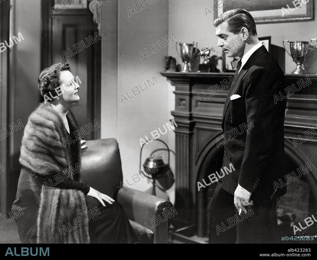 CLARK GABLE and MARY ASTOR in ANY NUMBER CAN PLAY, 1949, directed by MERVYN LEROY. Copyright M.G.M.