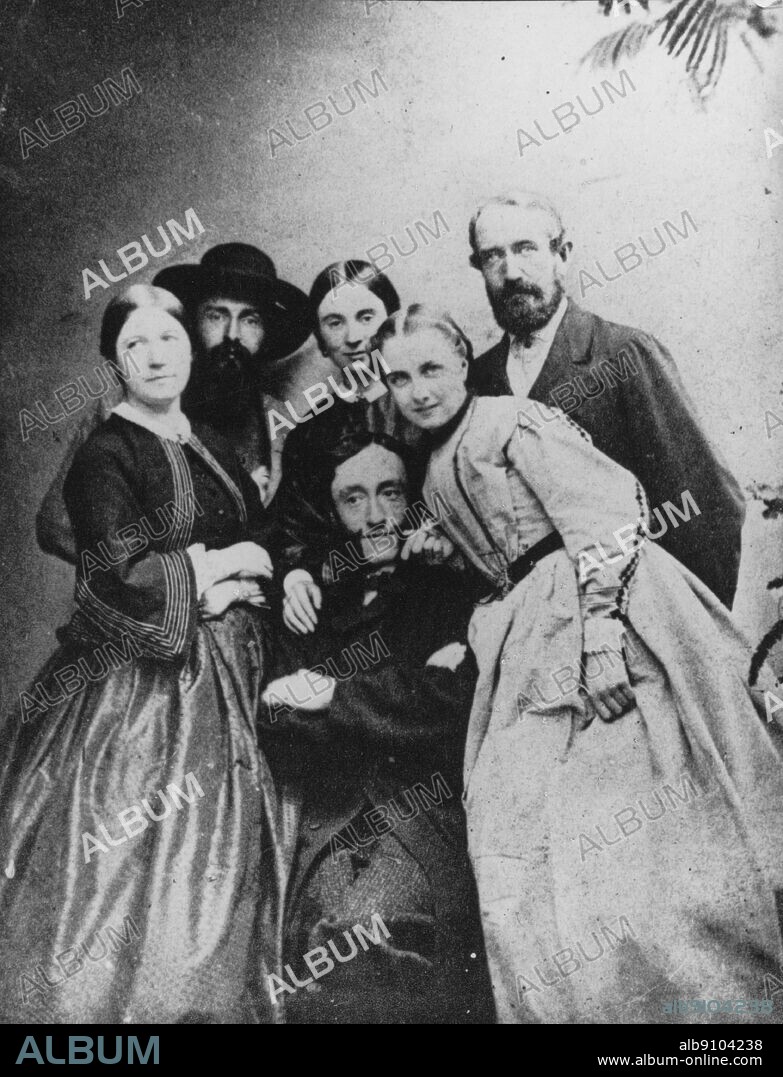 Early photograph of George Bernard Shaw's mother (left) and father (right) with George John Vandeleur Lee in the middle. George Bernard Shaw (1856-1950) was an Irish playwright and winner of the Nobel Prize for Literature in 1925. The Genius of Shaw page 24.