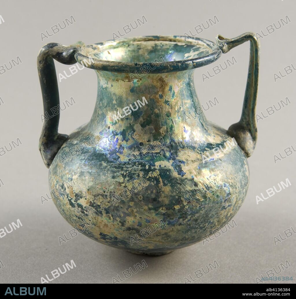 ANCIENT ROMAN. Jar. Roman; Levant or Syria. Date: 301 AD-500 AD. Dimensions: H. 8.3 cm (3 1/4 in.); diam. 8.6 cm (3 3/8 in.). Glass, blown technique. Origin: Syria.
