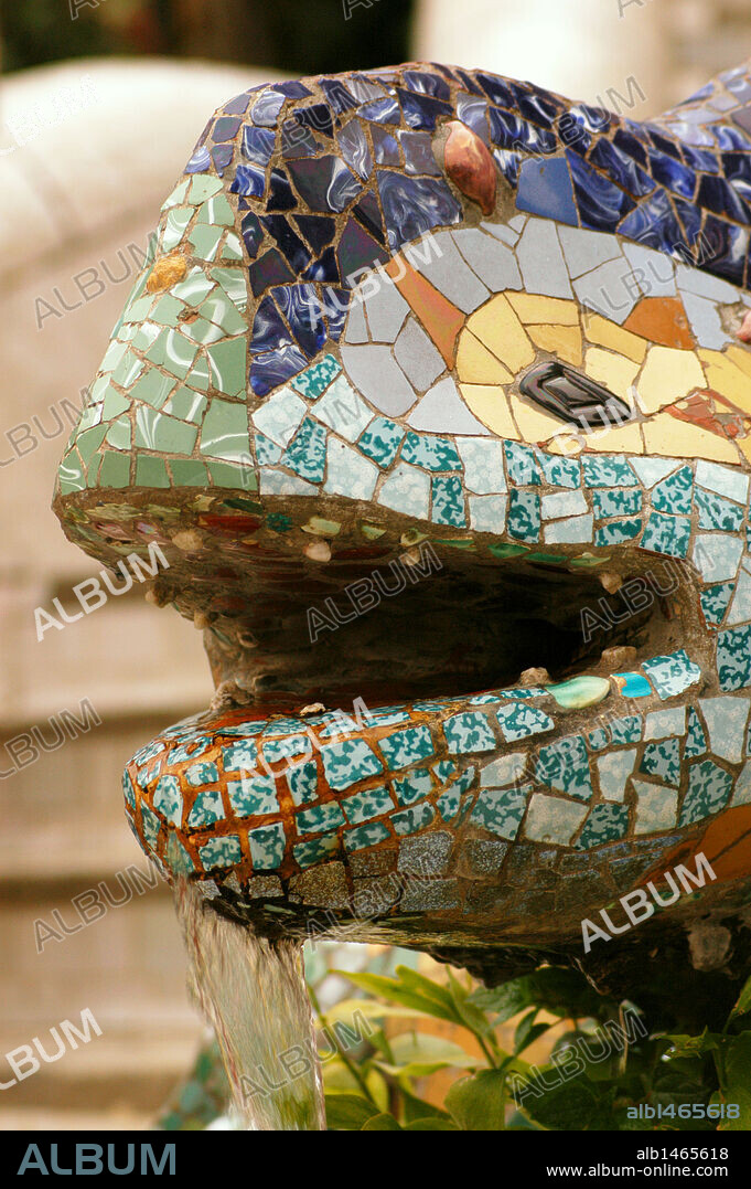 Spain. Catalonia. Barcelona. Park Guell. Built by Antoni Gaudi (1852-1926).  Dragon at the entrance. (1900-1914). Detail. Head.