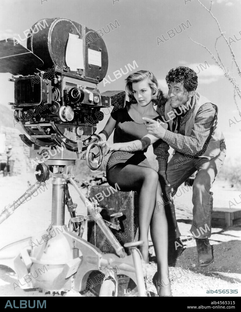 ANGIE DICKINSON and DEAN MARTIN in RIO BRAVO, 1959, directed by HOWARD HAWKS. Copyright WARNER BROTHERS.