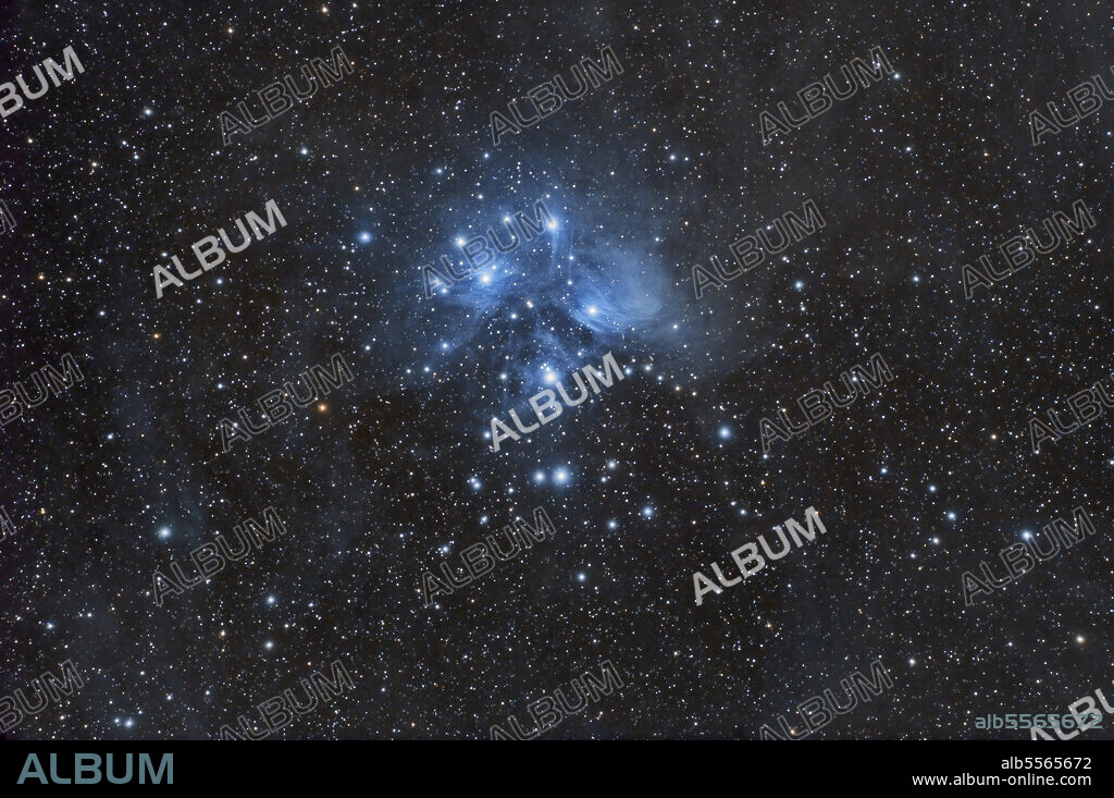 The famous reflection nebula and open star cluster in the Taurus Constellation known as the Pleiades, or Seven Sisters.