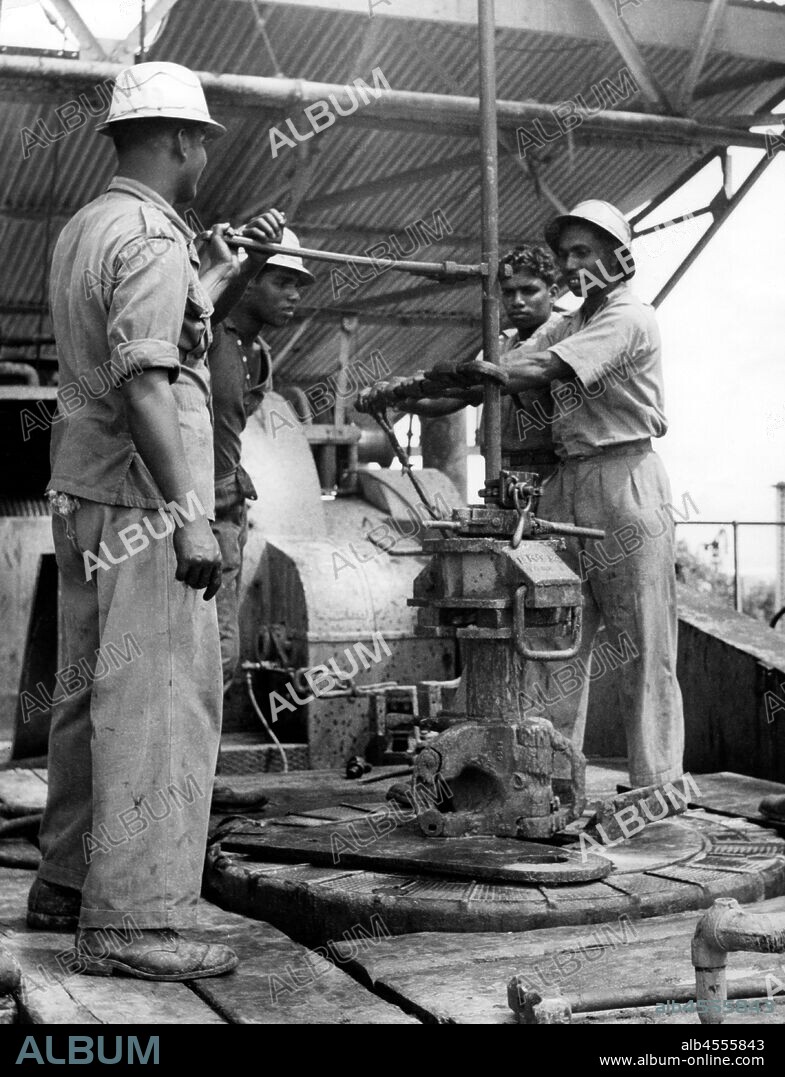 British asia. brunei. Indian workers to oil rigs. 1953.