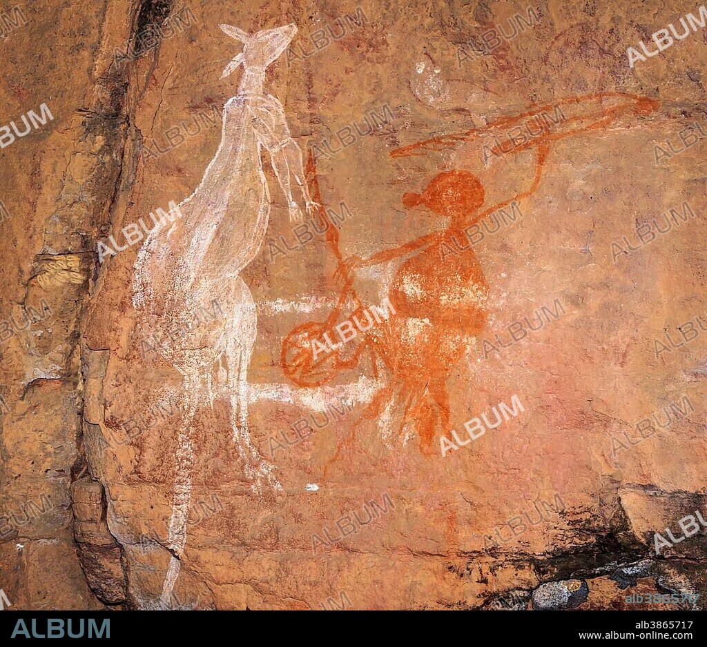 Old rock art of the Aborigines, hunting kangaroos with a spear, Nanguluwur Gallery, Kakadu National Park, Northern Territory, Australia