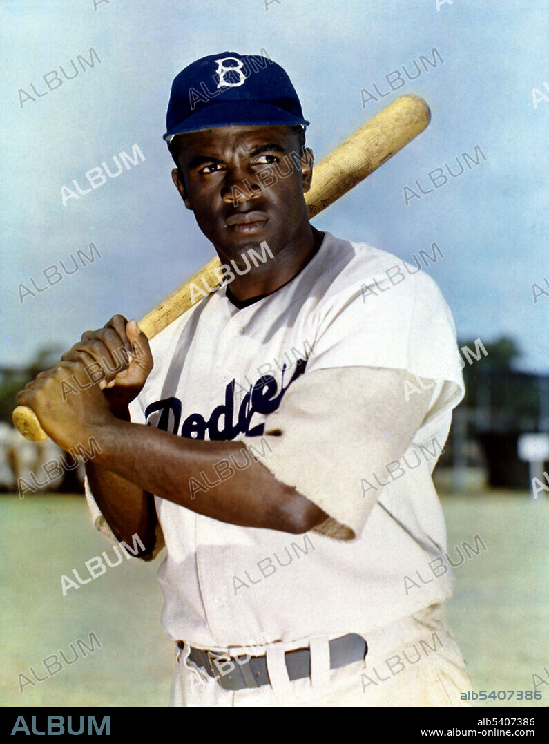 Jackie Robinson (1919 - 1972) was first African-American to play in MLB when he broke the color line and started at first base for the Brooklyn Dodgers in 1947. He won the inaugural Rookie of the Year Award, was an All-Star for six consecutive seasons (1949-54), and won the NL Most Valuable Player Award in 1949, the first black player so honored. In 1962, he was inducted into the Baseball Hall of Fame. No photographer credited, 1949 (cleaned).