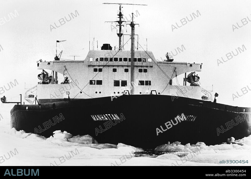 Canada:   November, 1969.The SS Manhattan, an oil tanker outfitted with an icebreaker bow, as she crossed the Northwest Passage in the Arctic. The ship is 1005 feet long, and its beam was increased form 132 feet to 148 feet by the addition of a protective "ice belt" to guard against hull penetration by the icebergs encountered on the expedition.