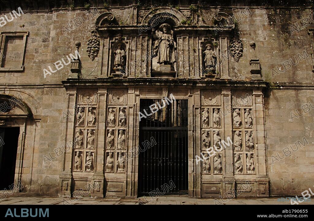 Santiago de Compostela, La Coruna province, Galicia, Spain. The Cathedral. Holy Door or Door of Pardon (1611). It is only opened in Jubilee Years. The niches contain the image of St. James and his disciples Athanasius and Theodore at his side (Baroque style). On the bottom and sides of the door were placed 24 figures of prophets and apostles coming from the old stone choir of Master Mateo (Romanesque style). East facade.