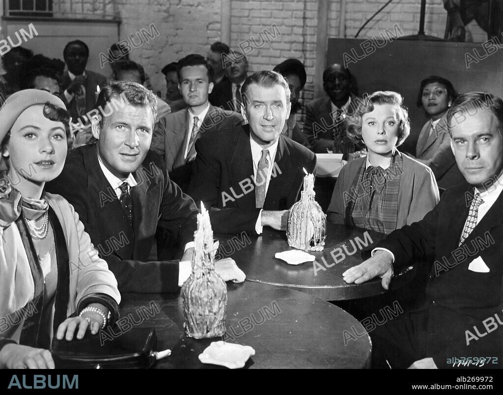 CHARLES DRAKE, HARRY MORGAN, JAMES STEWART and JUNE ALLYSON in THE GLENN MILLER STORY, 1953, directed by ANTHONY MANN. Copyright UNIVERSAL PICTURES.
