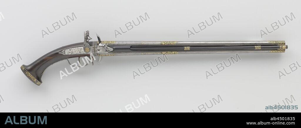 Double-barreled flint lock turnover pistol, flint gun with rotating barrel. The lock consists of three plates: a back plate with the lock mechanism and the two front plates each with a pan and a fire sample, the rooster is decorated with lace work, the lock is engraved and chiseled in bas-relief with flowers, floral scrolls and a snake, the cock screw has a head of gilt brass, signature on the front plates. The two walks mounted one above the other are dotted in gold with three groups of leafy tendrils on a blued surface: on the back, in the middle and near the trumpet. The rosewood stock consists of two parts: the grooved front drawer, on one side for the loading stick, and the handle. The iron fitting is decorated in the same way as the barrels and consists of two loading rod sleeves, a loop-shaped trigger guard with a pawl for the turning mechanism, an S-shaped screw plate engraved with two entangled hoses and a strap around the butt cap damsided with arabesques, the ebony loading stick has an iron cap with the same decoration as the loading tube sleeves, Maastricht, Limburg, Michel de la Pierre (attributed to), Maastricht (possibly), 1645 - 1650, brass (alloy), gilding (material), gold (metal), rosewood (wood), iron (metal), ebony (wood), gilding, l 71.6 cm l 50.5 cm d 12.35 mm w 1402 gr.