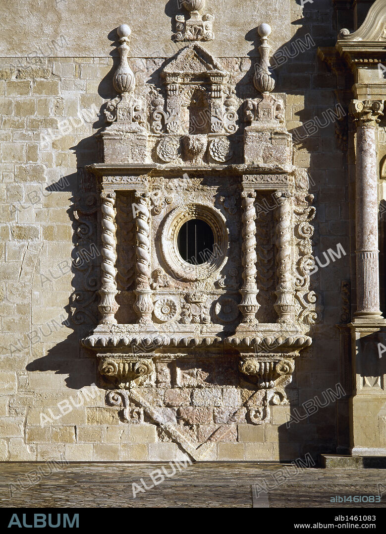 Royal Abbey of Santa Maria de Poblet. Cistercian monastery. Church of Saint Mary. Oval window added in the 18th century with Baroque ornamentation and Salomonic columns. Vimbodi, province of Tarragona. Catalonia, Spain.