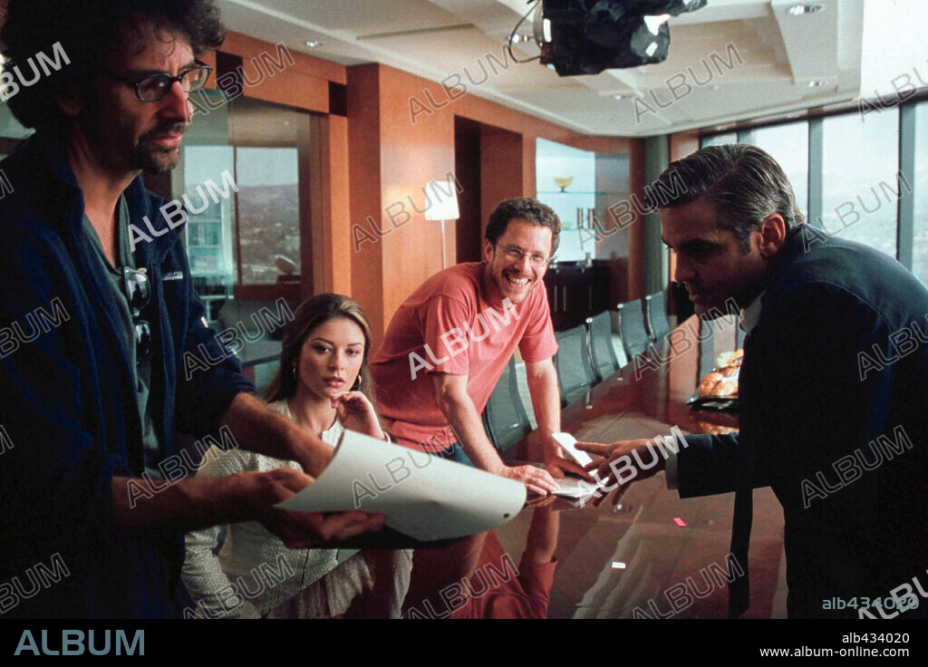 CATHERINE ZETA-JONES, ETHAN COEN, GEORGE CLOONEY and JOEL COEN in INTOLERABLE CRUELTY, 2003, directed by ETHAN COEN and JOEL COEN. Copyright UNIVERSAL PICTURES.