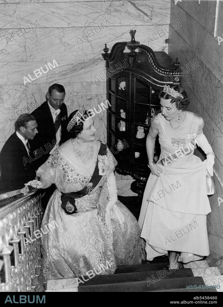 Arriving For a Royal Dinner.Queen Ingrid of Denmark, and Queen Elizabeth of Britain (Left), followed by King Frederik and King George, Mount the Stairs of the Danish embassy, London, as they arrive for a Royal dinner held at the Embassy. May 10, 1951.