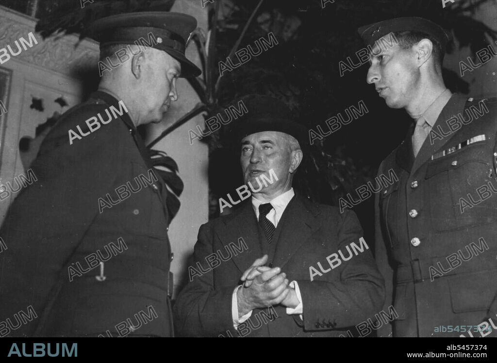 Darlan Meets Eisenhower -- Admiral Darlan (in center), whose position was the subject of secret session of the House of Commons on December 10th, confering with General Eisenhower, Commander-in-Chief of the United nations Forces, (left)., and Lieut-General Mark Clark (right) outside their Headquarters in Algiers. It was after negotiations with General Eisenhower that Admiral Darlan became Head of the French Administration in North Africa. December 12, 1942.