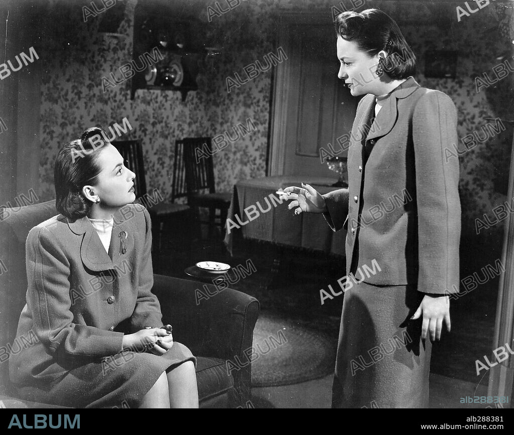 OLIVIA DE HAVILLAND en A TRAVÉS DEL ESPEJO, 1946 (THE DARK MIRROR), dirigida por ROBERT SIODMAK. Copyright UNIVERSAL PICTURES.