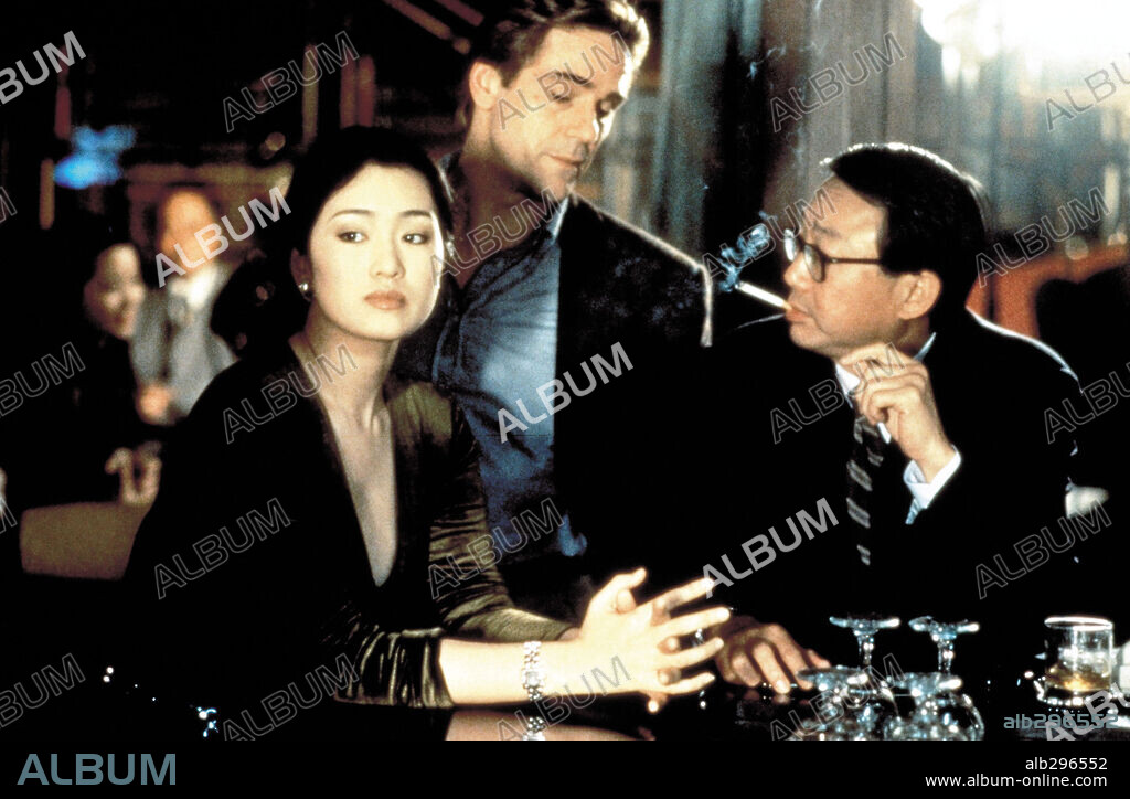 JEREMY IRONS and LI GONG in CHINESE BOX, 1997, directed by WAYNE WANG. Copyright TRIMARK PICTURES.