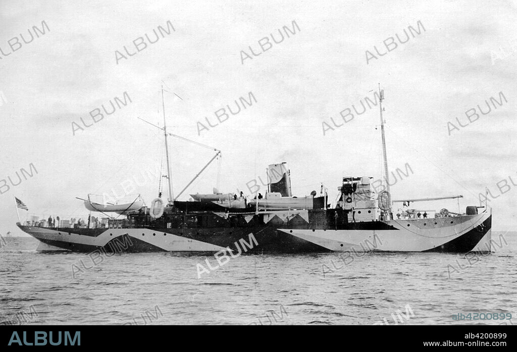 The USS Fulton (AS-1), an American submarine tender painted in Dazzle camouflage, in the Charleston South Carolina Navy Yard on November 1, 1918.