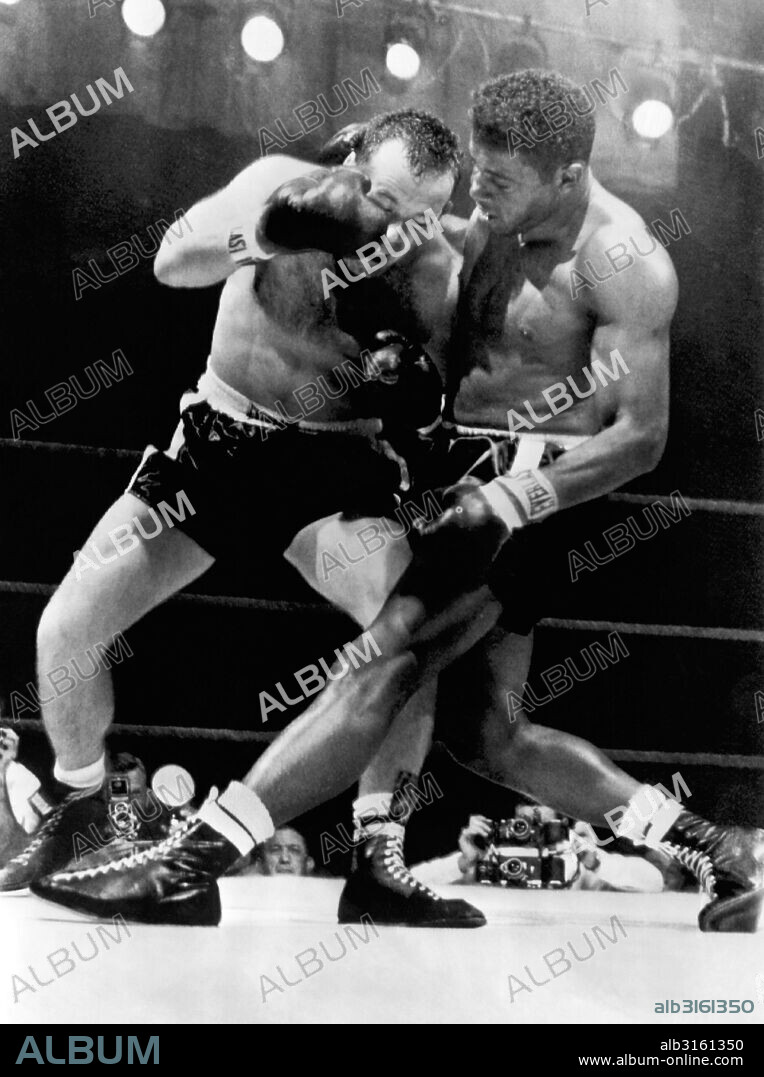 Miami Beach, Florida: March 13, 1961 Heavyweight champion Floyd Patterson and Ingemar Johansson engage in some fancy footwork in their heavywight boxing championship match. Patterson won with the sixth round knockout.