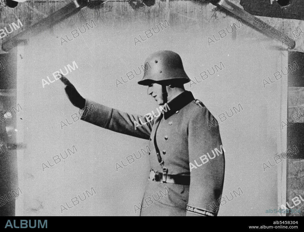 The soldier gives a salute made famous by Adolf Hitler. January 01, 1951. (Photo by Look Magazine).
