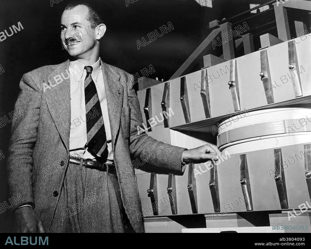 McMillan with wooden model of synchrotron, 1946. Edwin Mattison McMillan (September 18, 1907 - September 7, 1991) was an American physicist. He joined the group of Ernest Lawrence at the University of California, before moving to the Berkeley Radiation Laboratory. His experimental skills lead to the discovery of oxygen-15 with M. Stanley Livingston and beryllium-10 with Samuel Ruben. In 1940 he and Philip Abelson created neptunium, while conducting a fission experiment of uranium-239 with neutrons, using the cyclotron. During WWII, he was involved in research on radar at MIT and in 1942 was recruited to the Manhattan Project, involved in implosion research. In 1945 he developed ideas for the improvement of the cyclotron, leading to the development of the synchrotron. The synchrotron was used to create new elements at Berkeley Radiation Laboratory extending the periodic system of elements far beyond the 92 elements known before 1940. With Glenn T. Seaborg, he shared the Nobel Prize in Chemistry in 1951 for "discoveries in the chemistry of the transuranium elements." In 1954 he was appointed associate director of the Lawrence Radiation Laboratory, being promoted to director in 1958, where he stayed until his retirement in 1973. He died in 1991 at the age of 83.