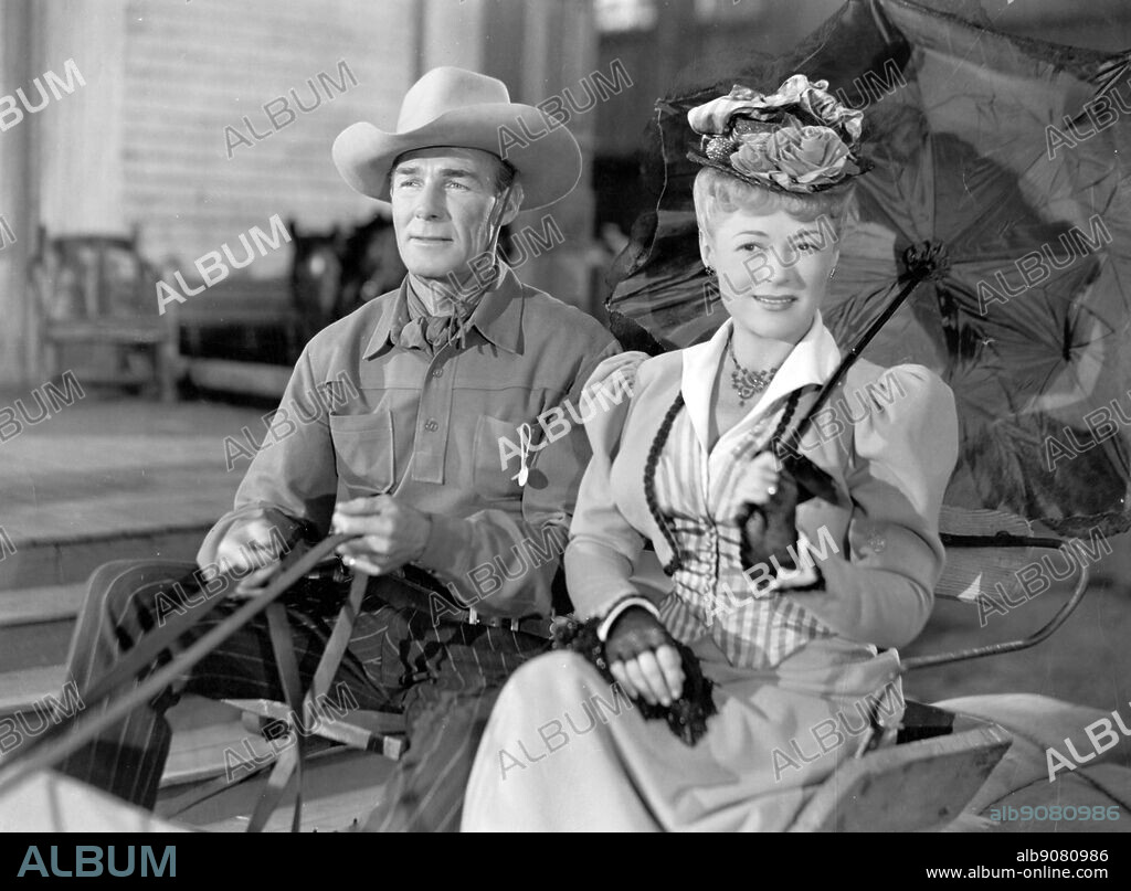 MARGUERITE CHAPMAN and RANDOLPH SCOTT in CORONER CREEK, 1948, directed by RAY ENRIGHT. Copyright COLUMBIA PICTURES.