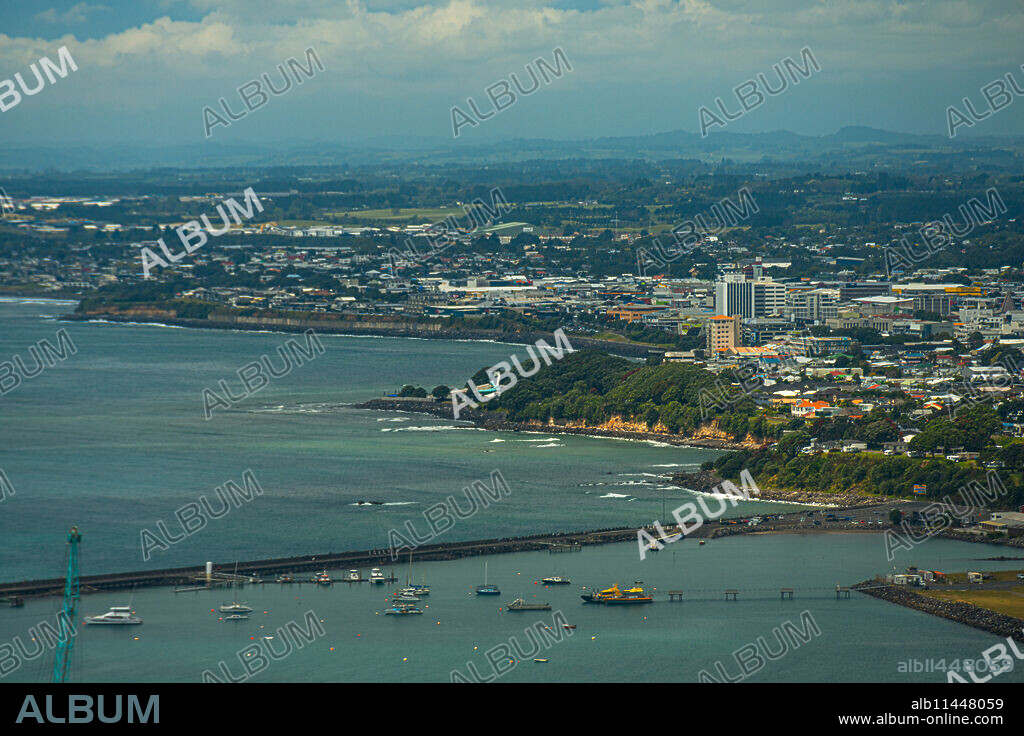 View onto the shore and skyline of New Plymouth, New Zealand. Looking along the coastline.
