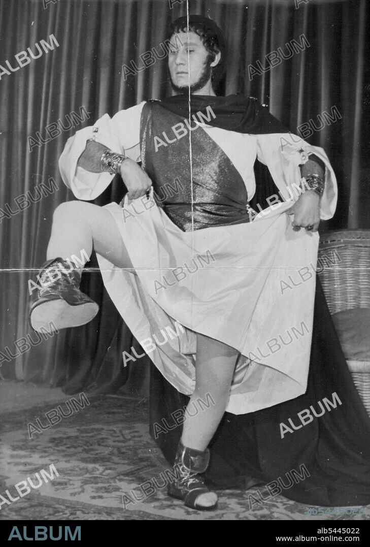 A New "Nero" -- Simpathetic actor dressed by roman inperator. The well-known Italian comic actor Alberto Sordi will be the interpreter of the new satiric film named "Nero" American Gloria Swanson will be Agrippina. Showing a leg. Italian comic Alberto Sordi will play the name role in a new satiric film, Nero. His co-star in the role of Agrippina is Gloria Swanson. December 01, 1955. (Photo by Vedo).