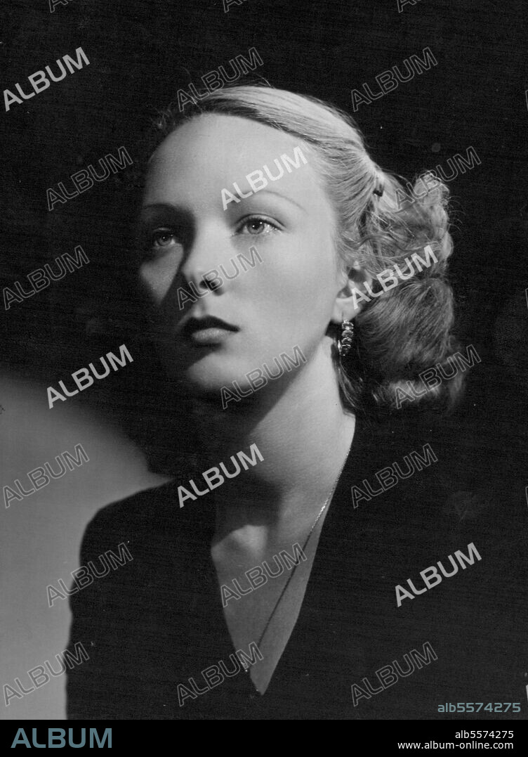 Lady Iris Mountbatten -- Formerly Lady Iris O'Mallery; she is the only daughter of the first Marquess of Carisbrooke. She has that remote, clear-skinned beauty, typical of the superior Englishwoman. American advertising men hastened to exploit it and also her regal connections. November 27, 1951. (Photo by Bassano, Camera Press).