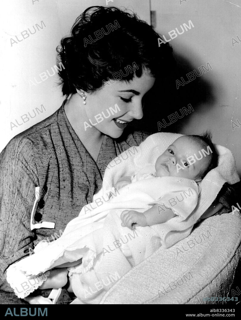 Hello, Mike! ... First pictures of Michael Howard Wilding, born January 6, 1953. Proud parents are M-G-M stars Elizabeth Taylor (soon to be seen, appropriately enough, in "The Girl Who Had Everything") and English actor Michael Wilding. April 17, 1953. (Photo by G.J. Anstin).