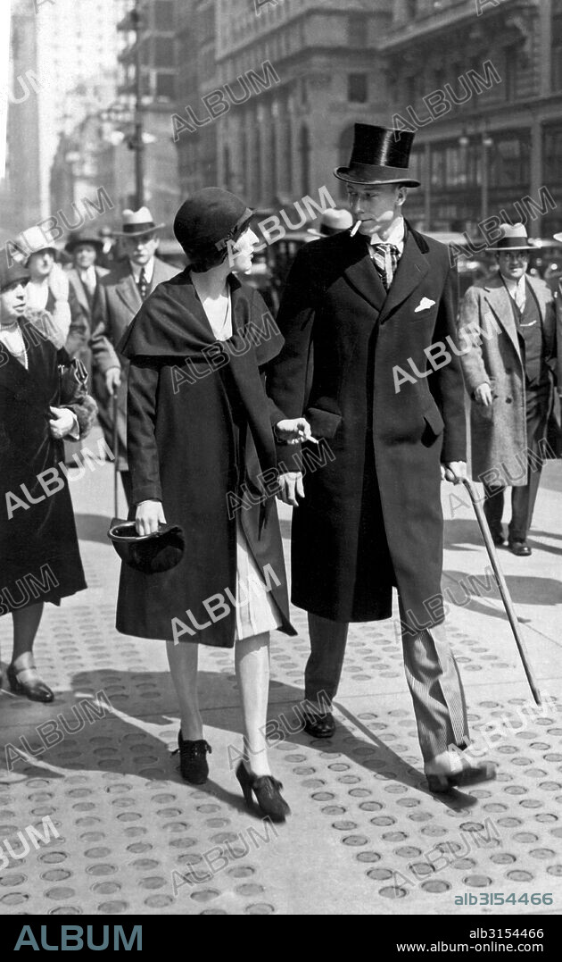 New York, New York:   1928. Women publicly fire up their 'Torches Of Freedom' Lucky Strike cigarettes during the Fifth Avenue  Easter Parade as a gesture of freedom and absolute equality with men. The demonstration was organized by public relations maestro, Edward Bernays for his client, the American Tobacco Company.