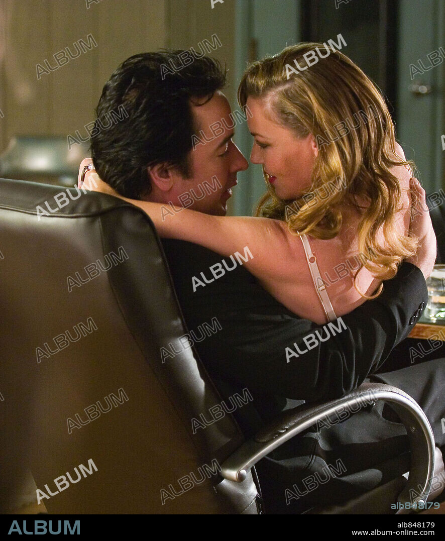 CONNIE NIELSEN and JOHN CUSACK in THE ICE HARVEST, 2005, directed by HAROLD RAMIS. Copyright FOCUS FEATURES/BONA FIDE PRODUCTIONS / HODES, CHUCK.