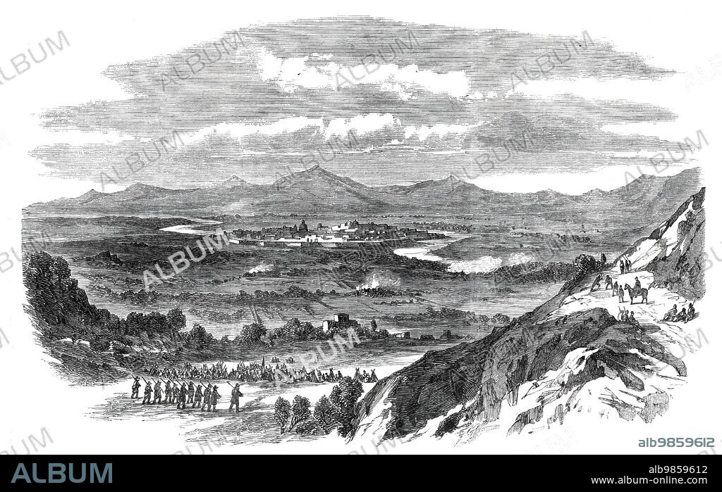 View of Capua, from Monte St. Angelo - from a sketch by our special artist, Frank Vizetelly, 1860. 'The Sketch from which our Engraving is taken was made...shortly before the battle on the Volturno took place. In the field in the foreground is bivouacked a battalion of Garibaldians serving as supports to the advanced line thrown out by the national army. The houses burning in the middle distance had been occupied by the Garibaldians but the Neapolitans coming up in force compelled the few troops that held them to fall back. Skirmishing is going on at the extreme right, on both banks of the Volturno. Capua stands on the left bank of the Volturno, which forms so extensive a curve as to surround at least two-thirds of the town. Its fortifications, first erected in 1231 by Fuccio Florentine, were reconstructed and enlarged by Vauban on the modern system. They were remodelled and strengthened with earthworks in 1855, under the direction of a Russian officer. Capua ranks as one of the three military stations of the first class in the Neapolitan kingdom'. From "Illustrated London News", 1860.