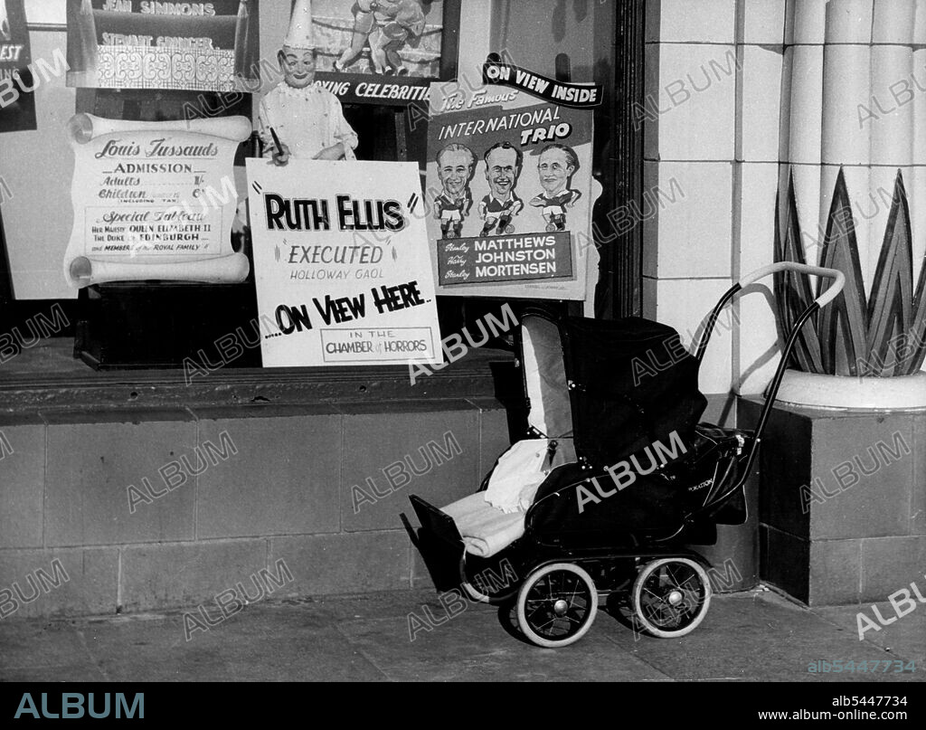Effigy of Ruth Ellis Draws crowds to Tussauds Waxworks Show at Blackpool -- A Child's pram stands empty outside the Waxwork's, while a poster in the Window announces the attraction. July 14, 1955. (Photo by Daily Herald).