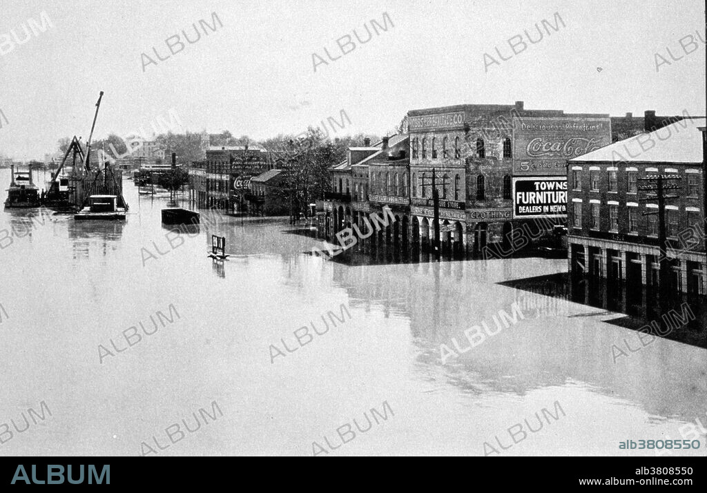 The Great Mississippi Flood of 1927 was the most destructive river flood in the history of the United States. The flood began when heavy rains pounded the central basin of the Mississippi in the summer of 1926. By September, the Mississippi's tributaries in Kansas and Iowa were swollen to capacity. Flooding overtook the levees causing the Mounds Landing to break with more than double the water volume of Niagara Falls. The Mississippi River broke out of its levee system in 145 places and flooded 27,000 square miles. This water flooded an area 50 miles wide and more than 99 miles long. The flood caused over $400 million in damages and killed 246 people in seven states. The flood affected Arkansas, Illinois, Kentucky, Louisiana, Mississippi, Missouri, Tennessee, Texas, Oklahoma and Kansas. By May 1927, the Mississippi River below Memphis, Tennessee, reached a width of 60 miles. Photo originally captioned: "The Great Mississippi River Flood of 1927. The river front at Cape Girardeau, Missouri, on April 20, 1927. The river stage was at 40 feet." From: "The Floods of 1927 in the Mississippi Basin", Frankenfeld, H.C., 1927. Monthly Weather Review Supplement No. 29.
