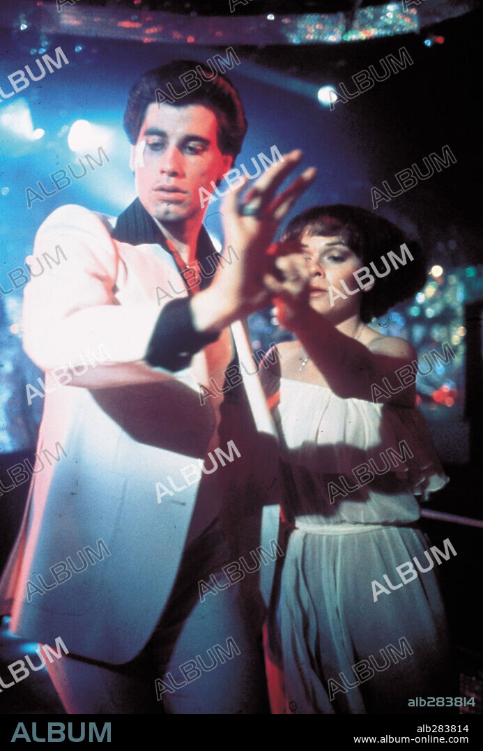 JOHN TRAVOLTA and KAREN LYNN GORNEY in SATURDAY NIGHT FEVER, 1977, directed by JOHN BADHAM. Copyright PARAMOUNT PICTURES.