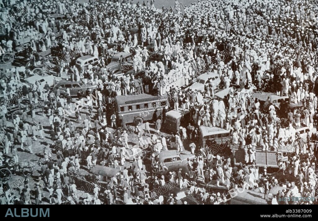 Funeral of Mohandas Karamchand Gandhi after he was assassinated in the garden of Birla House, on 30 January 1948. Gandhi (1869 - 1948), was the preeminent leader of the Indian independence movement in British-ruled India. Employing nonviolent civil disobedience, Gandhi led India to independence and inspired movements for civil rights and freedom across the world.