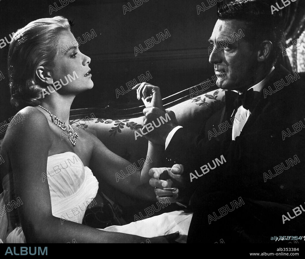CARY GRANT and GRACE KELLY in TO CATCH A THIEF, 1955, directed by ALFRED HITCHCOCK. Copyright PARAMOUNT PICTURES.