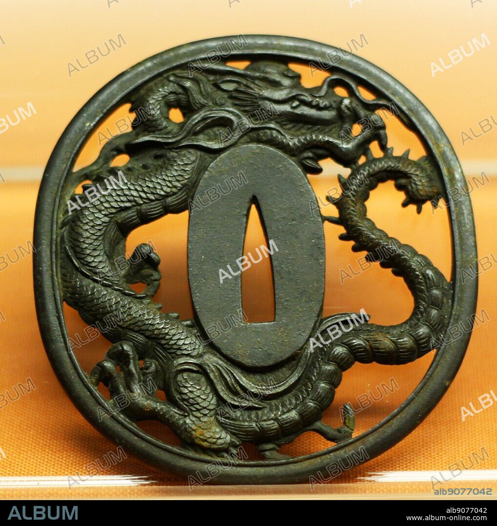 Japanese sword-guards (tsuba) 1800-1900, Edo or Meiji era. These guards were fixed on swords belonging to Japanese men of the samurai class. They protected the wearer's hand but also acted as a symbol of his status and beliefs. A Japanese myth said that the Emperor's sword, one of his three sacred possessions, came from the tail of a dragon.