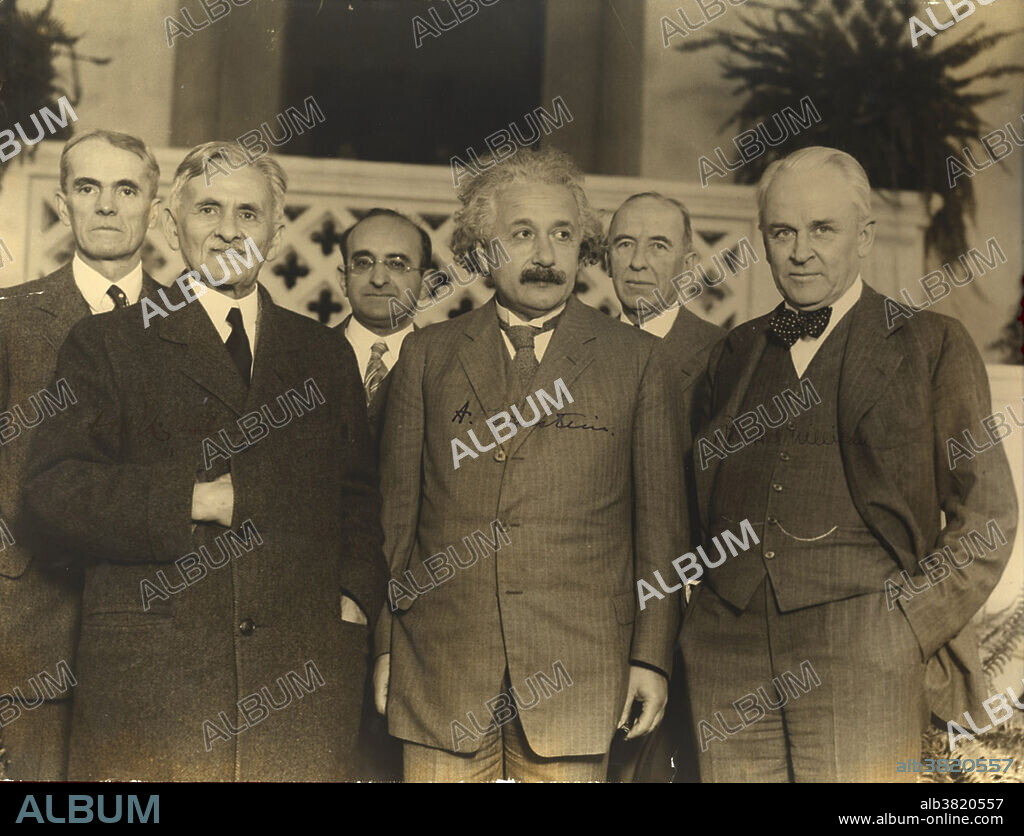 Editorial use only . Physicists Albert Michelson (1952-1931), Albert Einstein (1879-1955) and Robert A. Millikan (1863-1953) (front row, left to right) in Pasadena, California, in 1931. Millikan was instrumental in bringing German scientists to America. Back row: Walter S. Adams, Walther Meyer, Max Farrand. Michelson, Einstein and Millikan all received the Nobel Prize in Physics.