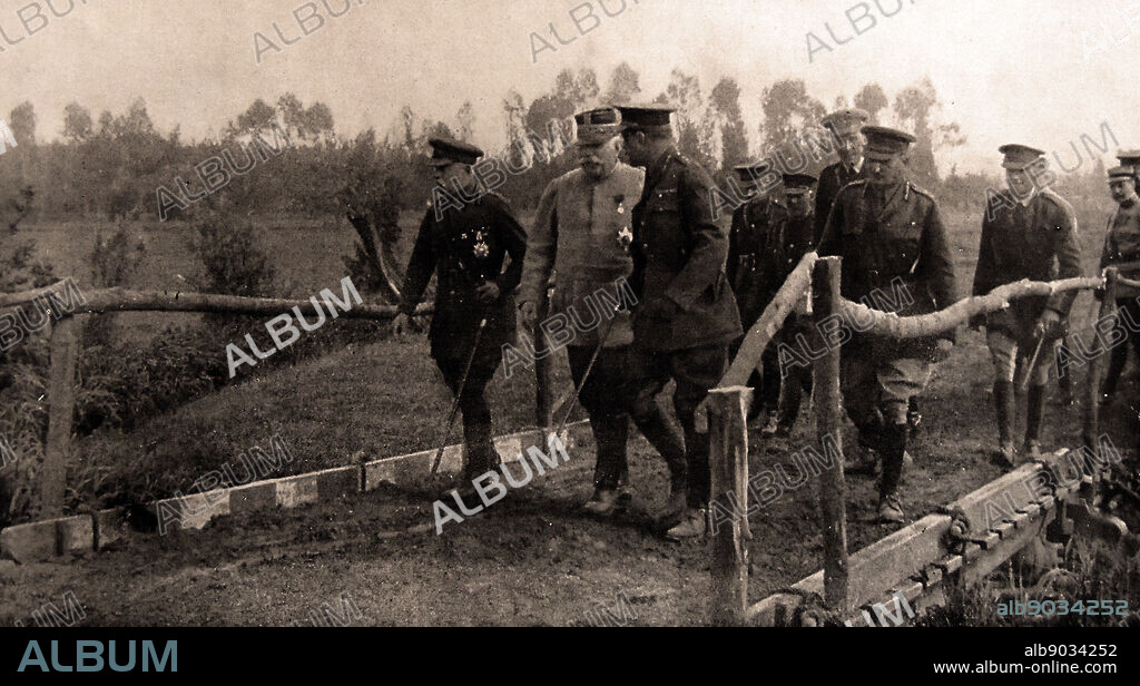 Marshall Joffre and British Field Marshal Sir Henry Hughes Wilson, with their staff officers, review the terrain at the front line in northern France 1915. Field Marshal Sir Henry Hughes Wilson (5 May 1864 22 June 1922) was one of the most senior British Army staff officers of World War I and served as Director of Military Operations at the War Office and as Sub Chief of Staff to the BEF.
