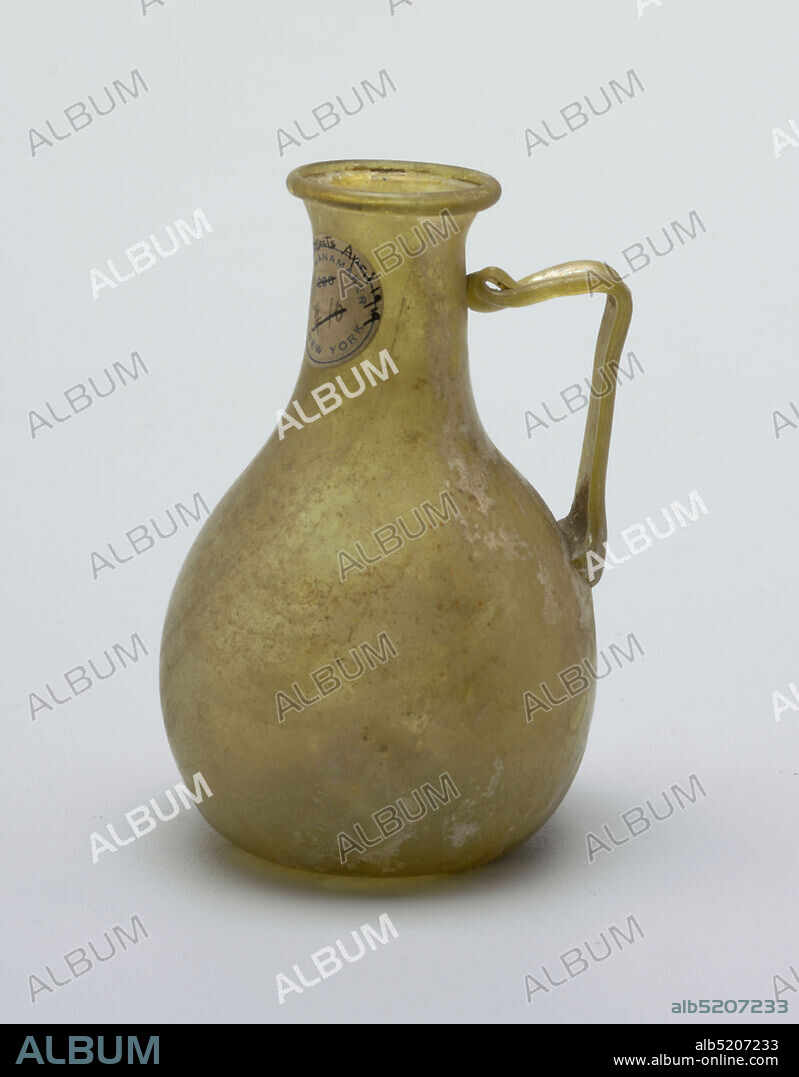 Ampulla, Glass, Olive green, iridescent, pear-shaped body with slightly flaring mouth, moulded lip; ridged strap handle from center of body to center of neck., Roman Empire, probably Syria, 2nd century, glasswares, Decorative Arts, Ampulla.