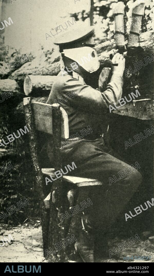 Russian soldier using a periscope rifle, First World War, 1914-1918, (c1920). 'Taking the Enemy's Range with a Hyposcope: a masked Russian officer at his trench-post'. A hyposcope was a periscope sighting rifle attachment, enabling the shooter to remain hidden below cover. The device was developed in response to trench warfare conditions. From "The Great World War - A History" Volume IV, edited by Frank A Mumby. [The Gresham Publishing Company Ltd, London, c1920].