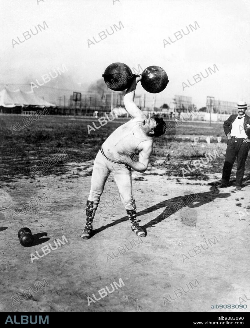 Fred Winters (United States), winner of the Dumb Bell Competition at the World Fair Olympic Games at St Louis 1904. The Olympic Games page 51.
