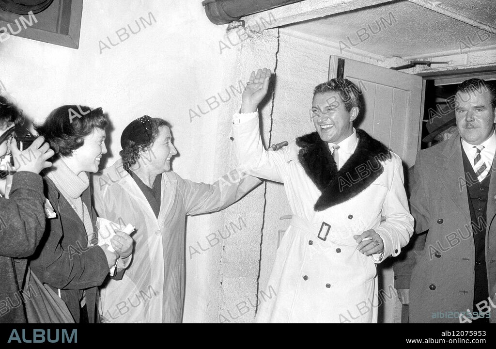 Liberace the famous American TV pianist seen in the London Airport after his arrival from the USA to appear on the Val Parnell Palladium Bill . 4 April 1958.
