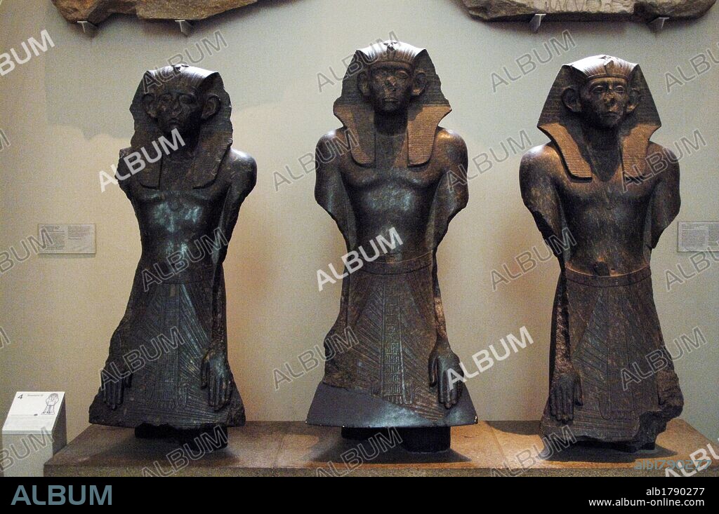 Three black granite statues of Sesostris III. 1850 BC. 12th Dynasty. Middle Kingdom. From the Temple of Mentuhotep, Lower South Court. Deir el-Bahri, Thebes. British Museum. London. United Kingdom.