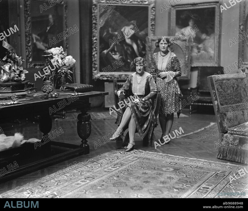 Twin daughters of the famous artist , Mr Frank O Salisbury . His daughters , Sylvia and Monica . 1 February 1930.